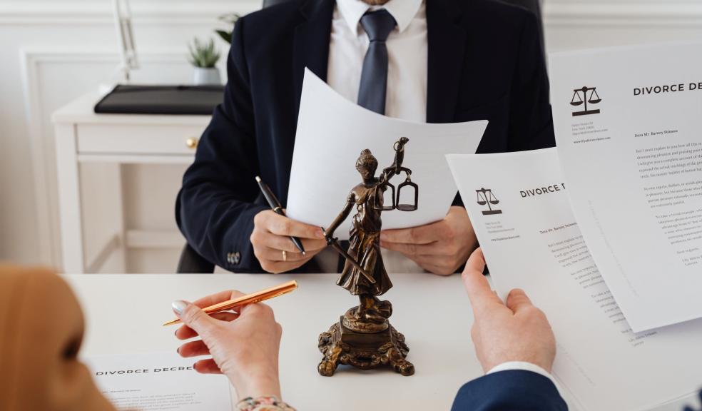 Lawyers Looking at Divorce Paper Lawyers Looking at Divorce Paper