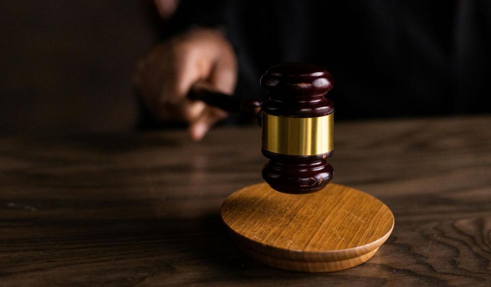 Brown Wooden Gavel on Brown Wooden Table Brown Wooden Gavel on Brown Wooden Table