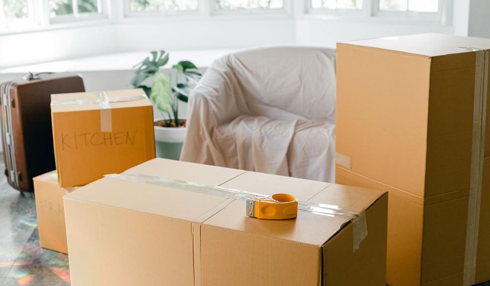Empty apartment with packed carton boxes before moving Empty apartment with packed carton boxes before moving