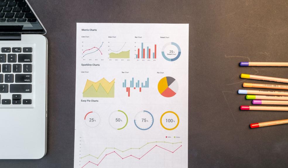 Charts On Black Wooden Table Charts On Black Wooden Table